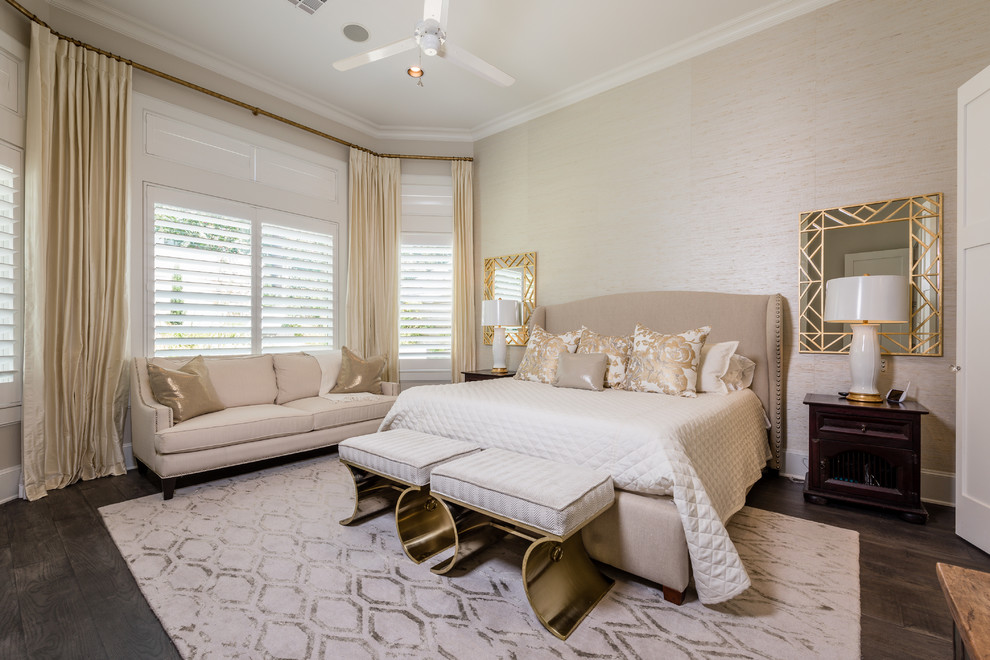 Design ideas for a large classic master bedroom in Austin with beige walls and dark hardwood flooring.
