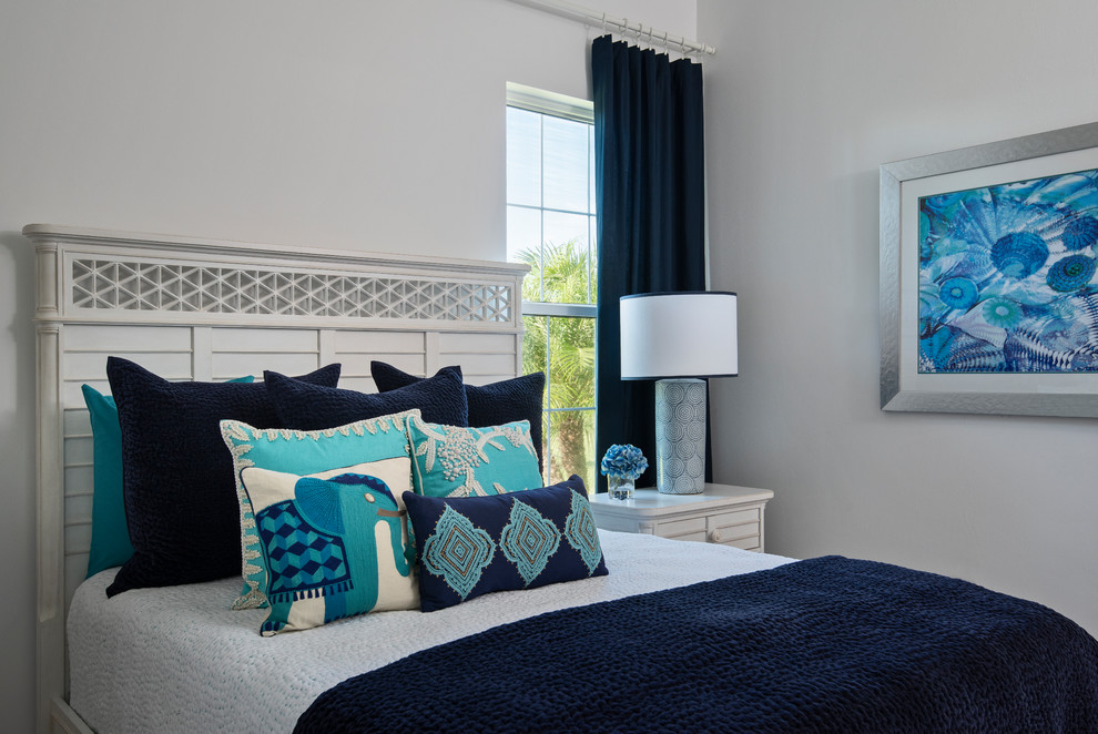 Design ideas for a medium sized coastal guest bedroom in Miami with white walls and no fireplace.