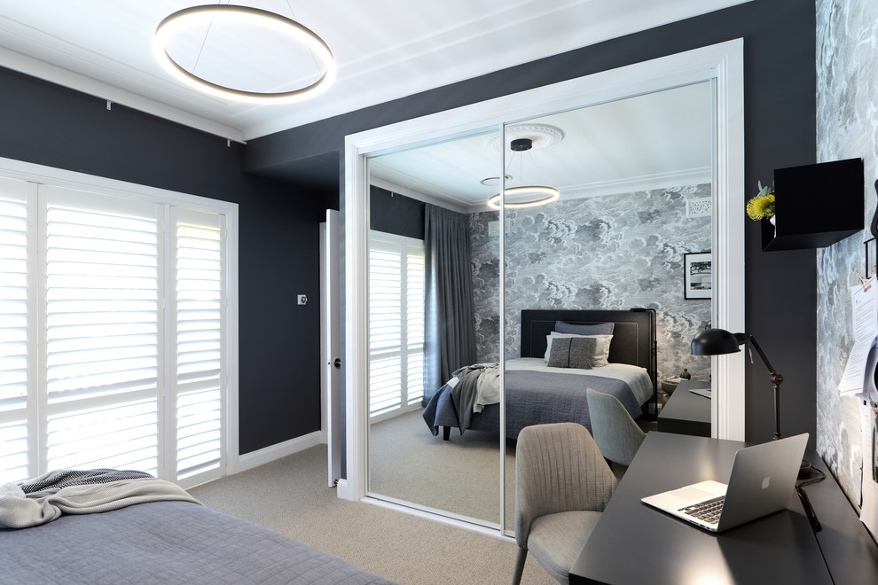 This is an example of a medium sized contemporary bedroom in Sydney.