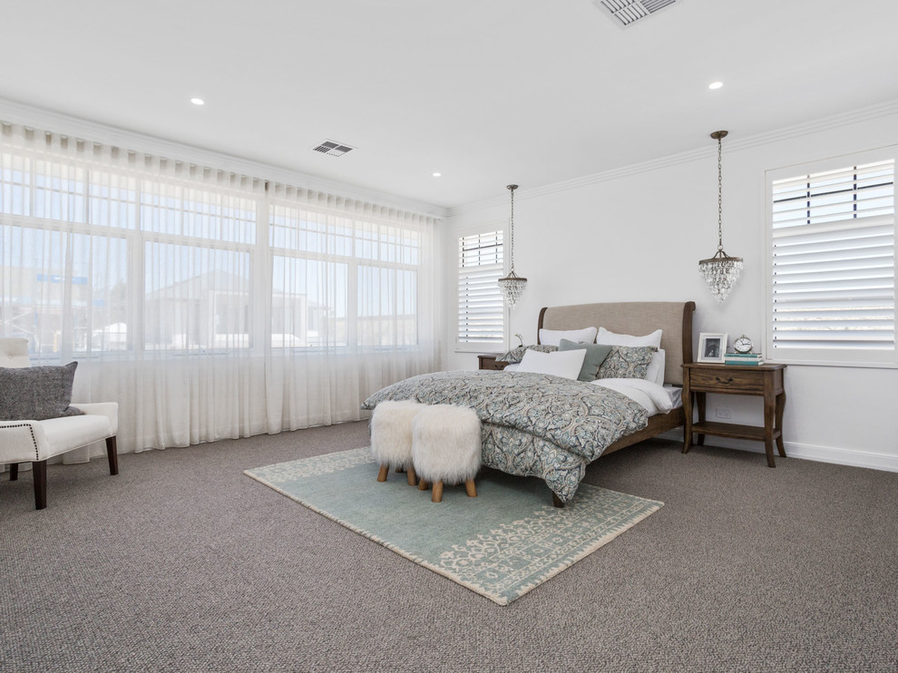 Inspiration for a large transitional carpeted and gray floor bedroom remodel in Perth with white walls