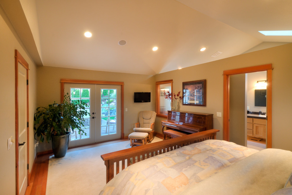 Medium sized classic master bedroom in Orange County with beige walls and medium hardwood flooring.