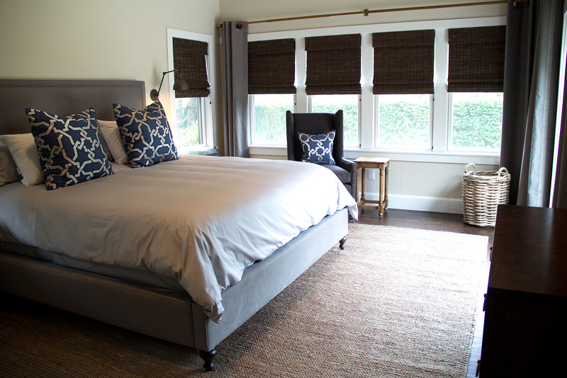 This is an example of a traditional grey and silver bedroom in Boston.