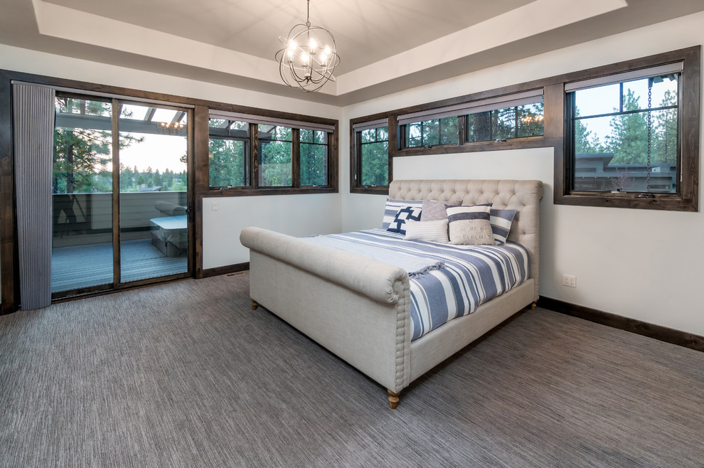 This is an example of a large contemporary master bedroom in Other with grey walls, carpet and grey floors.