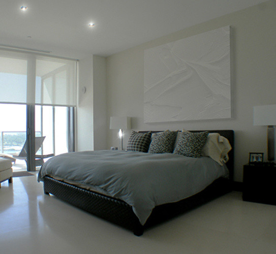 Design ideas for a large contemporary master bedroom in Miami with beige walls.