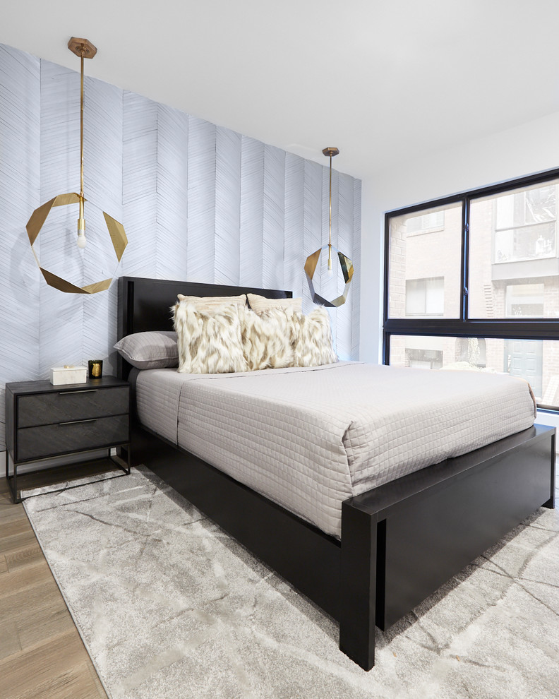 Contemporary bedroom in Philadelphia with grey walls, light hardwood flooring and beige floors.