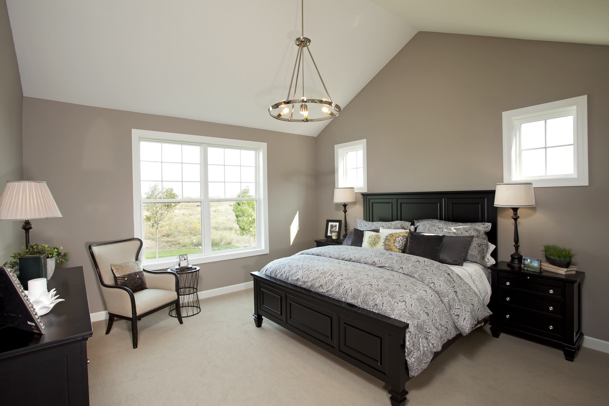 beige bedroom black furniture