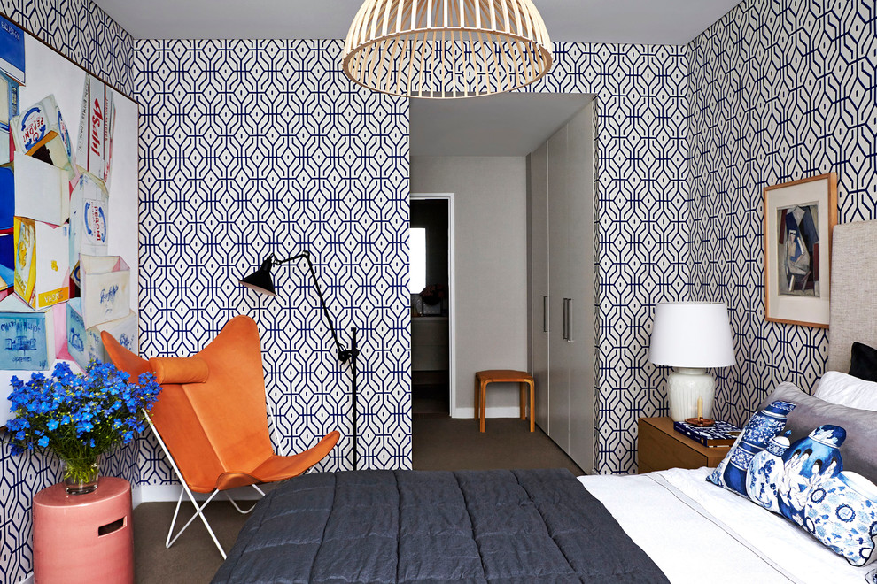 Example of a mid-sized trendy master carpeted bedroom design in Sydney with multicolored walls and no fireplace