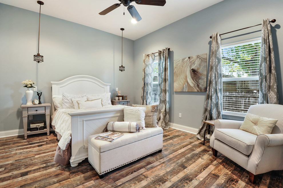 Example of a farmhouse master bedroom design in Other