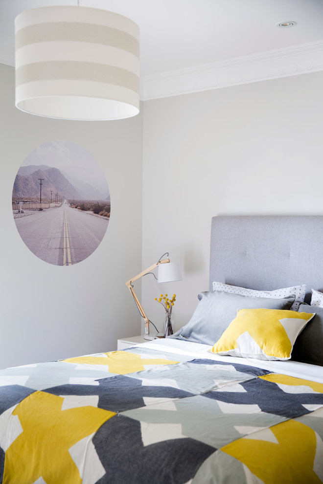 Contemporary bedroom in Sydney with beige walls.