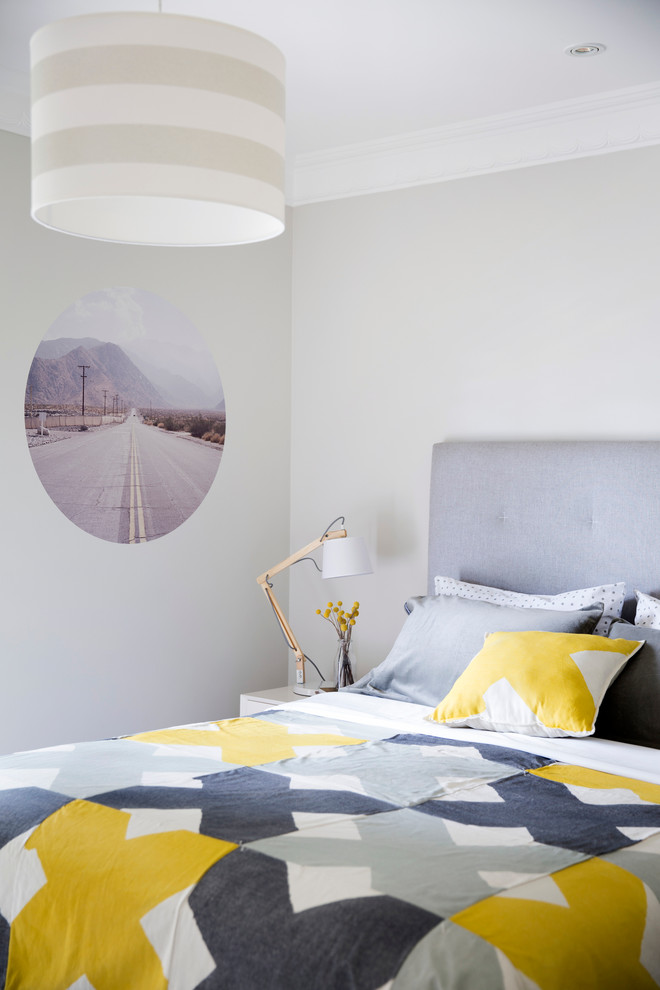 This is an example of a beach style guest bedroom in Sydney.