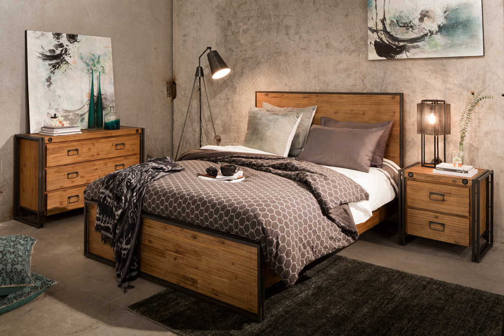Inspiration for a small industrial concrete floor bedroom remodel in Dallas with gray walls and no fireplace