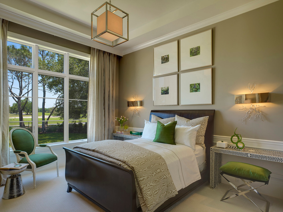 Inspiration for a transitional guest carpeted bedroom remodel in Miami with beige walls