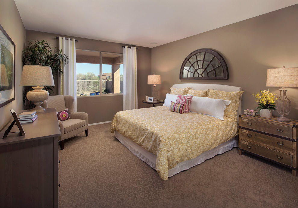 Design ideas for a contemporary bedroom in Phoenix with beige walls and carpet.