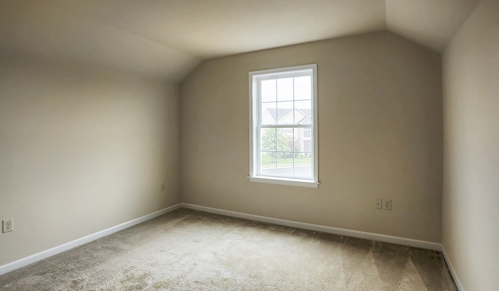 Example of a small transitional guest carpeted and beige floor bedroom design in Philadelphia with beige walls and no fireplace