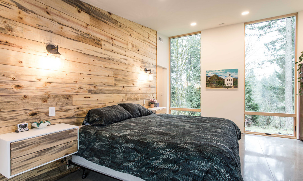Стильный дизайн: спальня в современном стиле с бетонным полом, серым полом и бежевыми стенами - последний тренд
