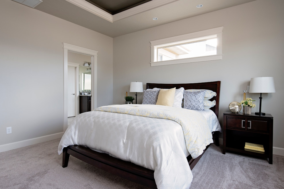 Medium sized classic master bedroom in Boise with grey walls, carpet and no fireplace.