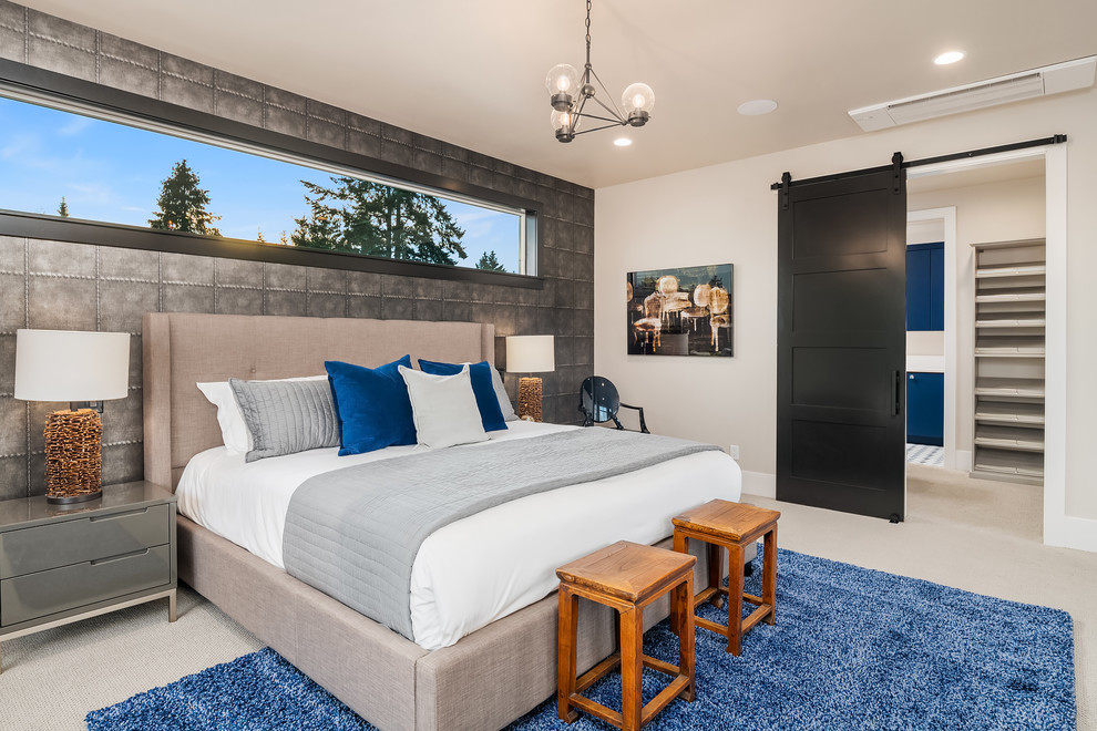 Esempio di una camera da letto minimal con pareti beige e pavimento beige