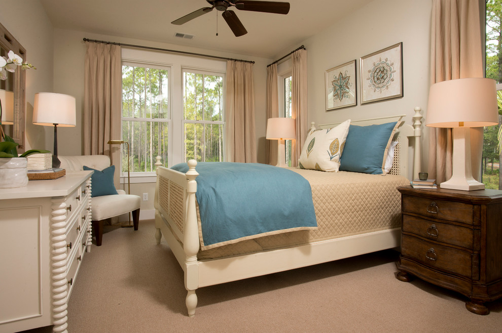 This is an example of a medium sized classic guest bedroom in Charleston with beige walls, carpet, no fireplace and beige floors.