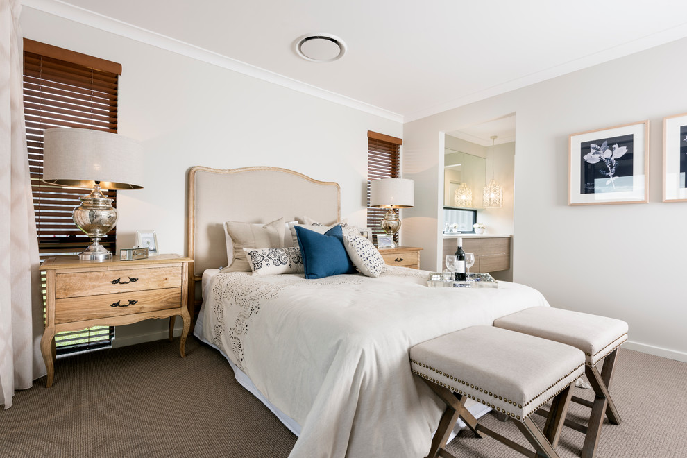 Inspiration for a mid-sized contemporary master carpeted bedroom remodel in Perth with beige walls