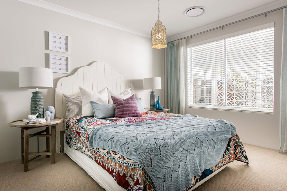 Mid-sized beach style guest carpeted bedroom photo in Perth with gray walls and no fireplace