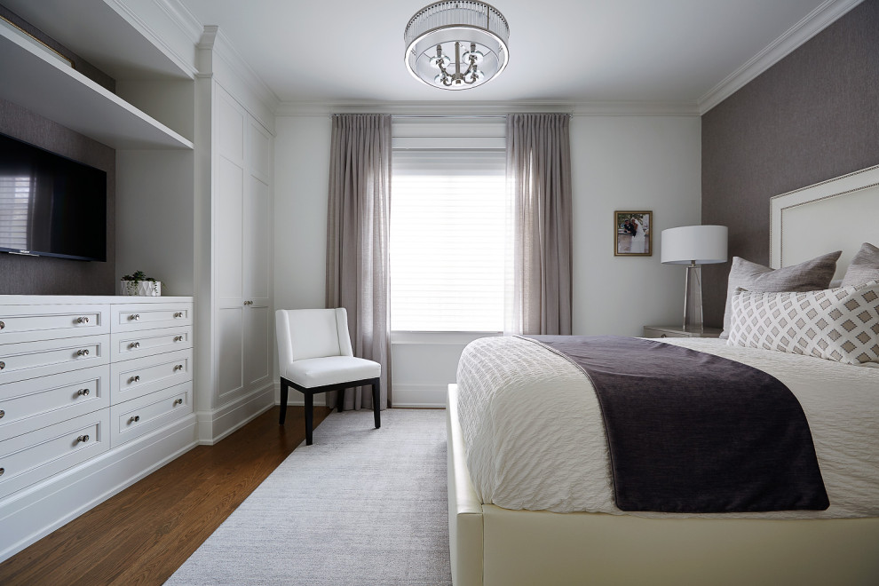 Bedroom - mid-sized transitional guest carpeted and beige floor bedroom idea in Toronto with white walls
