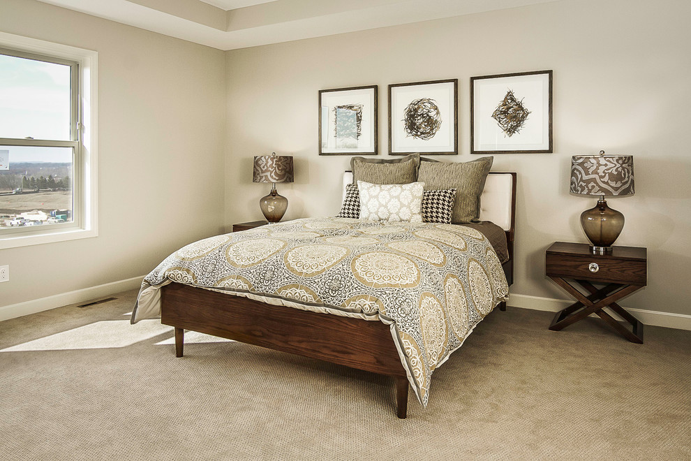 Example of a large transitional master carpeted bedroom design in Minneapolis with beige walls and no fireplace