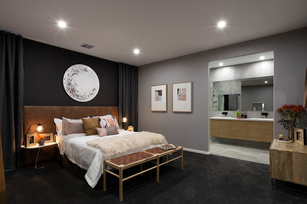 Esempio di una camera degli ospiti minimalista con pareti grigie, moquette e pavimento grigio