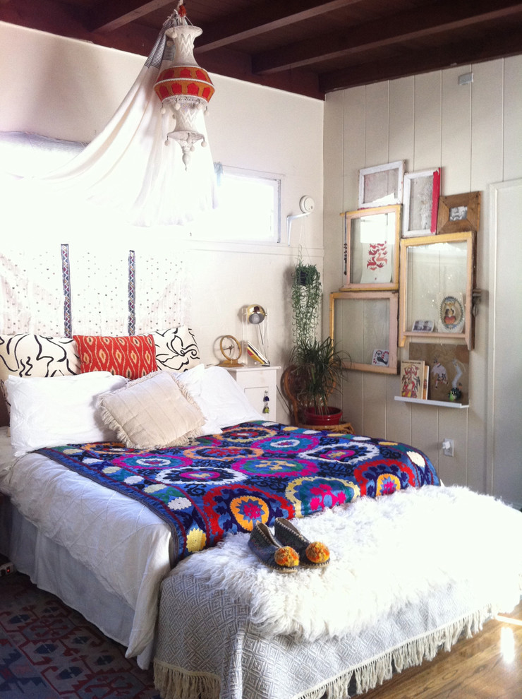 Bedroom - eclectic bedroom idea in Los Angeles with white walls