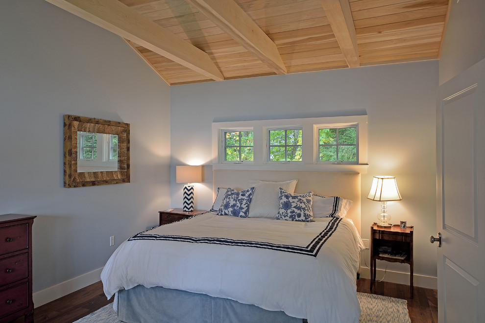 Design ideas for a medium sized traditional guest bedroom in Portland Maine with white walls and dark hardwood flooring.