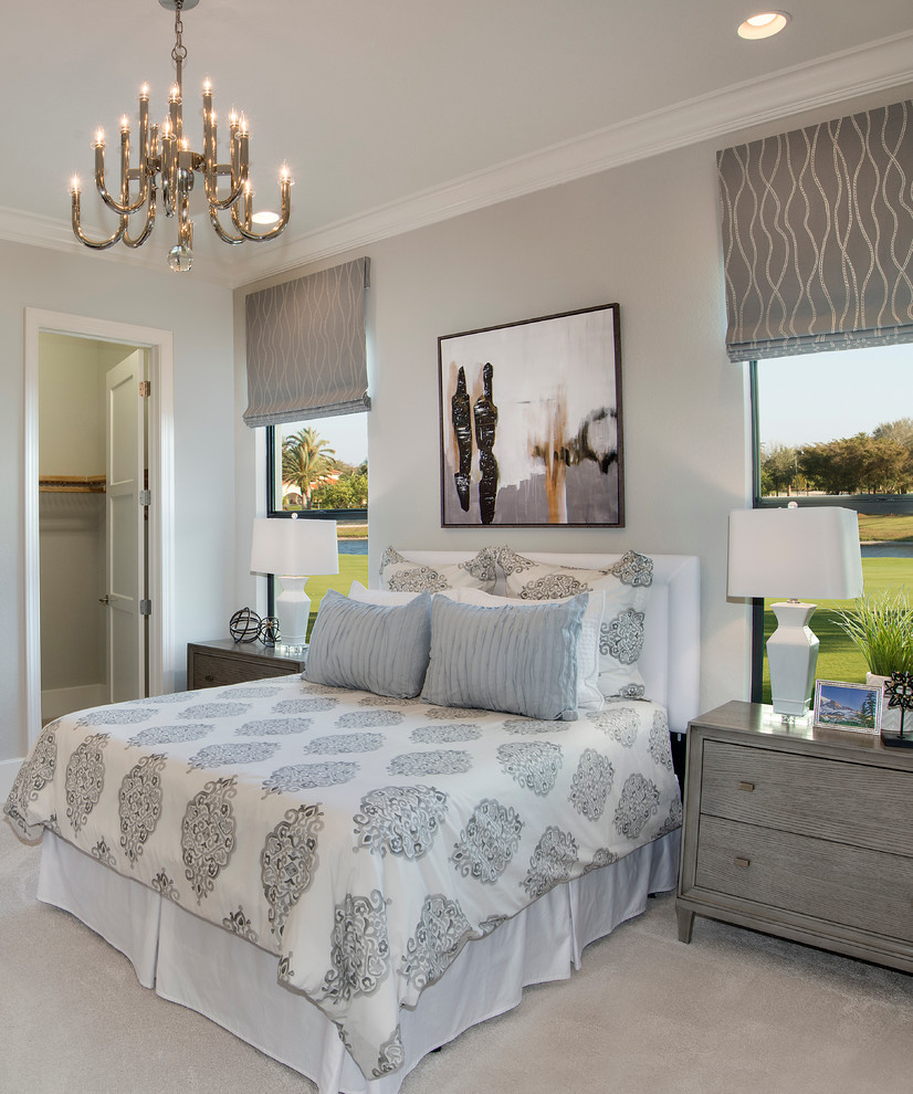 Transitional carpeted bedroom photo in Miami with gray walls