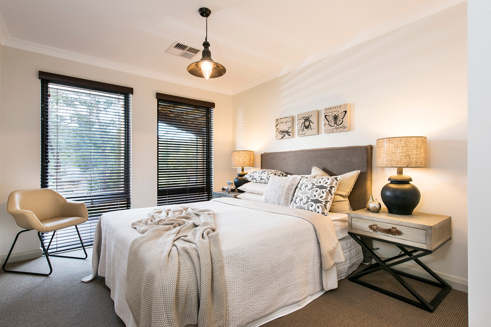 Traditional guest bedroom in Perth with white walls and carpet.