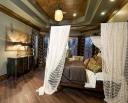 Example of a tuscan bedroom design in Houston