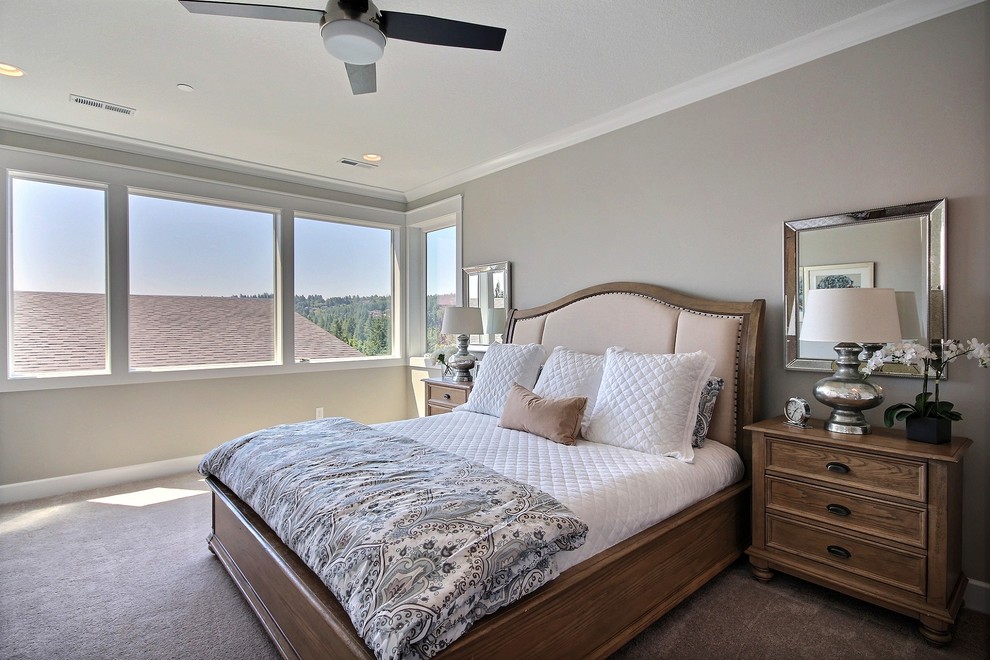 Inspiration for an expansive contemporary master and grey and cream bedroom in Portland with beige walls, carpet and beige floors.
