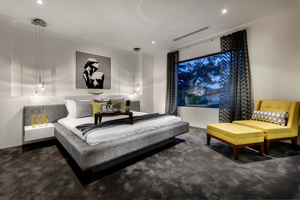 Large contemporary bedroom in Perth with white walls, carpet and no fireplace.