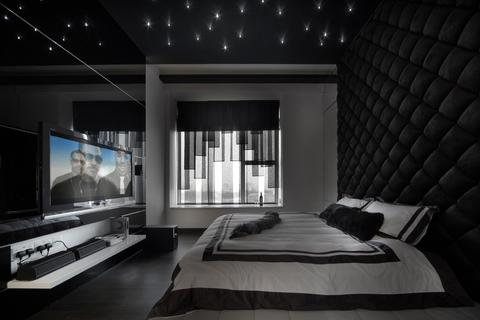 Bedroom - contemporary bedroom idea in Singapore with black walls