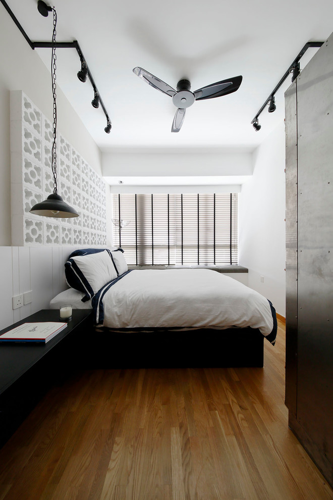 Inspiration for an industrial bedroom remodel in Singapore