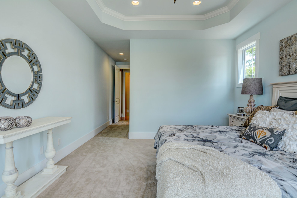 Inspiration for a medium sized beach style master bedroom in Baltimore with blue walls and carpet.