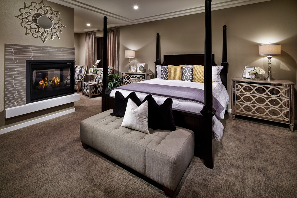 Inspiration for a contemporary bedroom remodel in Denver with a corner fireplace