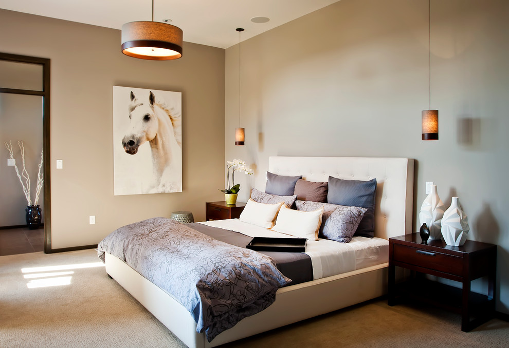 This is an example of a contemporary bedroom in Portland.