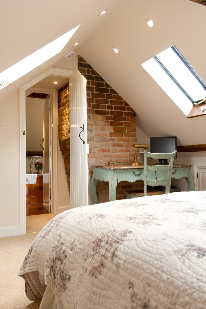 Design ideas for a farmhouse loft bedroom in Surrey.
