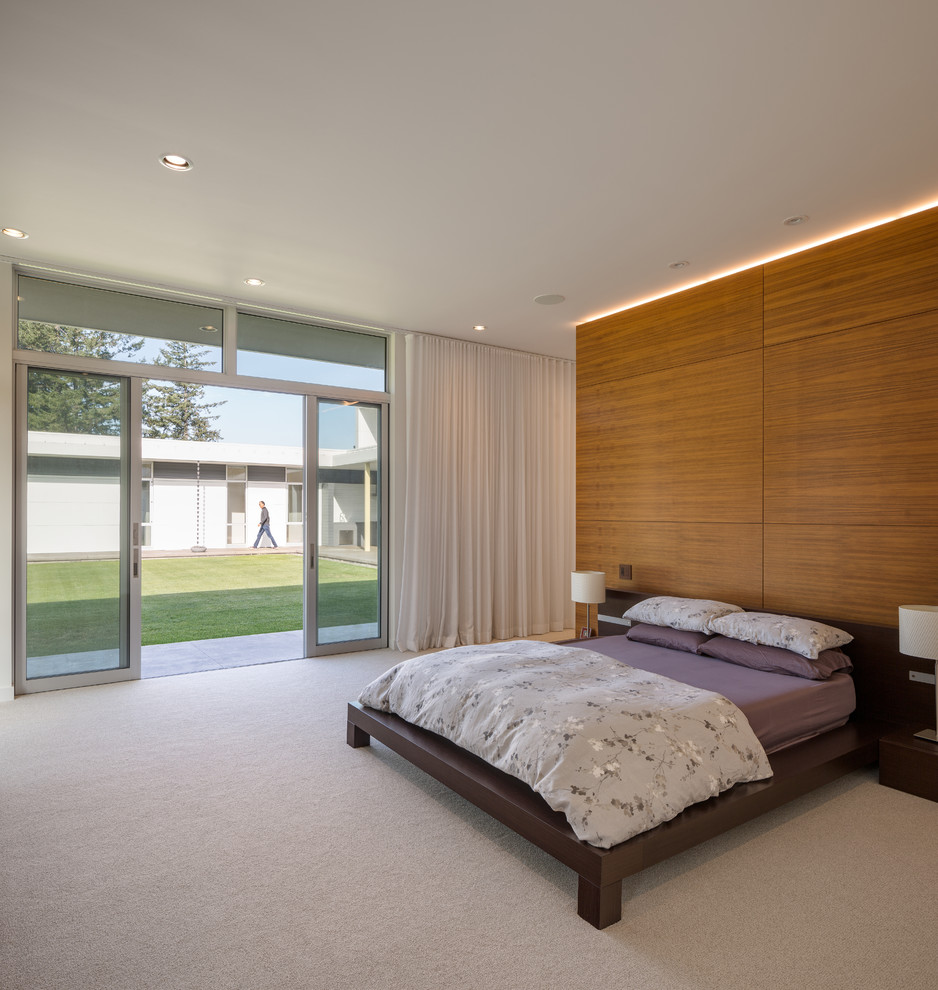 Идея дизайна: спальня в стиле модернизм с ковровым покрытием и серым полом