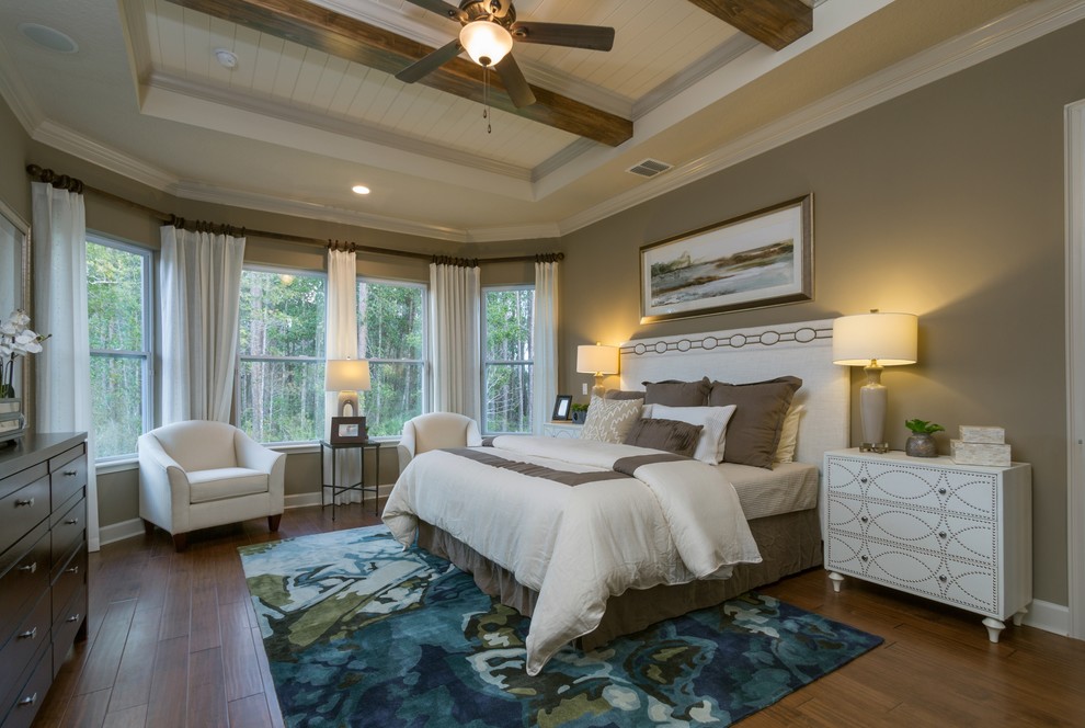 Large arts and crafts master medium tone wood floor bedroom photo in Jacksonville with brown walls