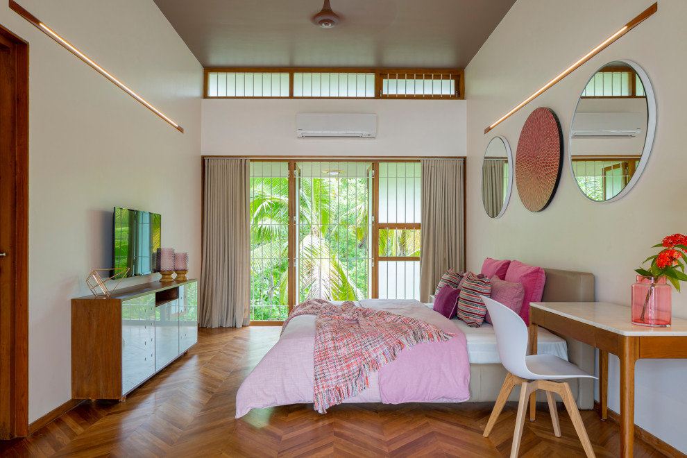 Bedroom - tropical bedroom idea in Other