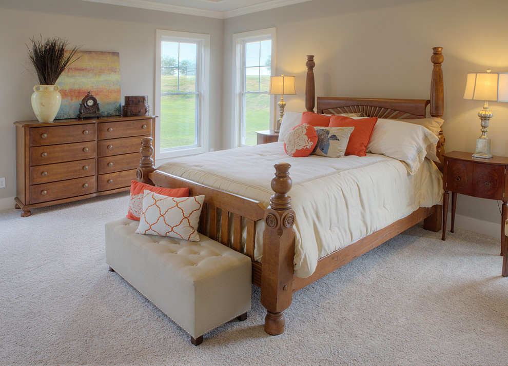 Inspiration for a large traditional master bedroom in Other with grey walls and carpet.