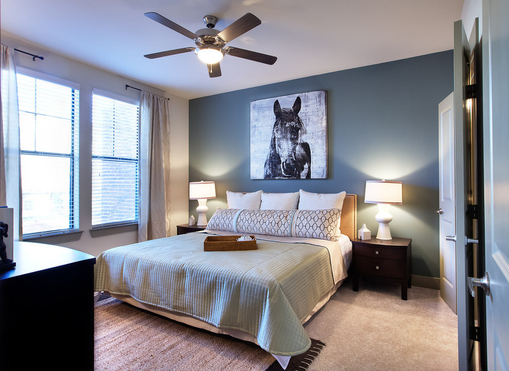 Mid-sized transitional master carpeted bedroom photo in Dallas with yellow walls