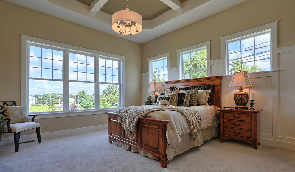 Design ideas for a large traditional master bedroom in Other with beige walls, carpet and no fireplace.
