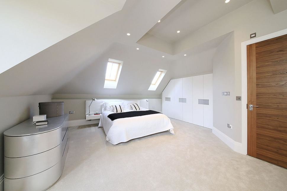 Photo of a modern grey and silver bedroom in London.