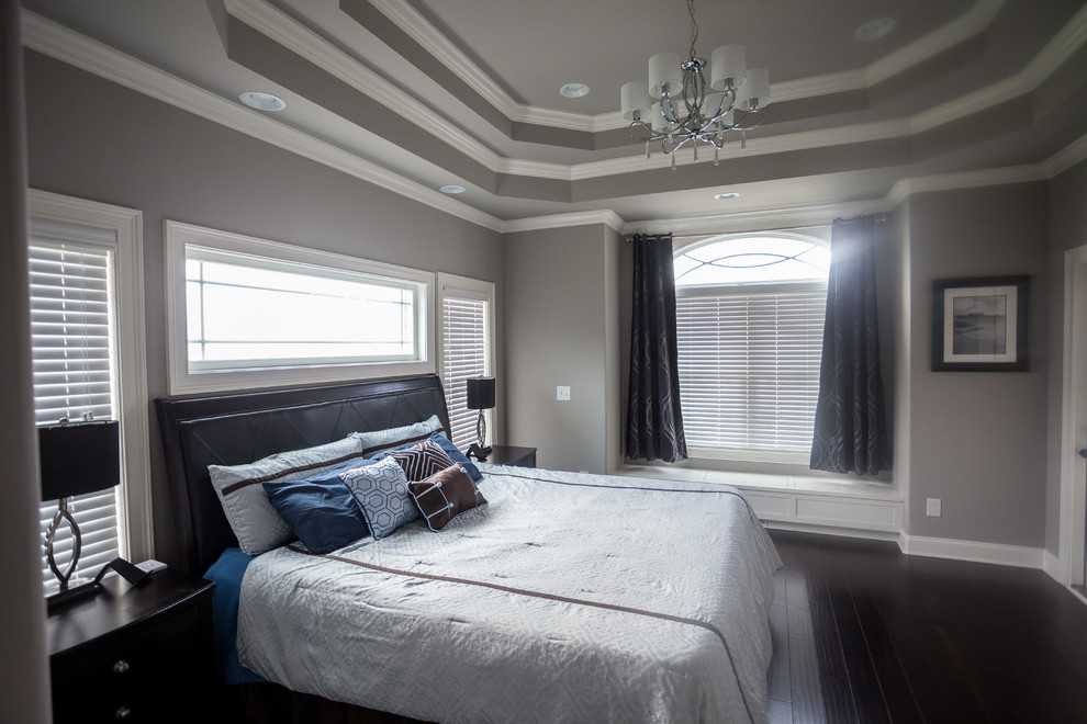 Mid-sized transitional master dark wood floor bedroom photo in Nashville with gray walls