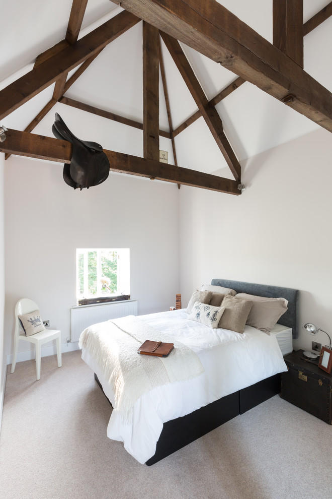 Bedroom - cottage carpeted bedroom idea in Surrey with white walls