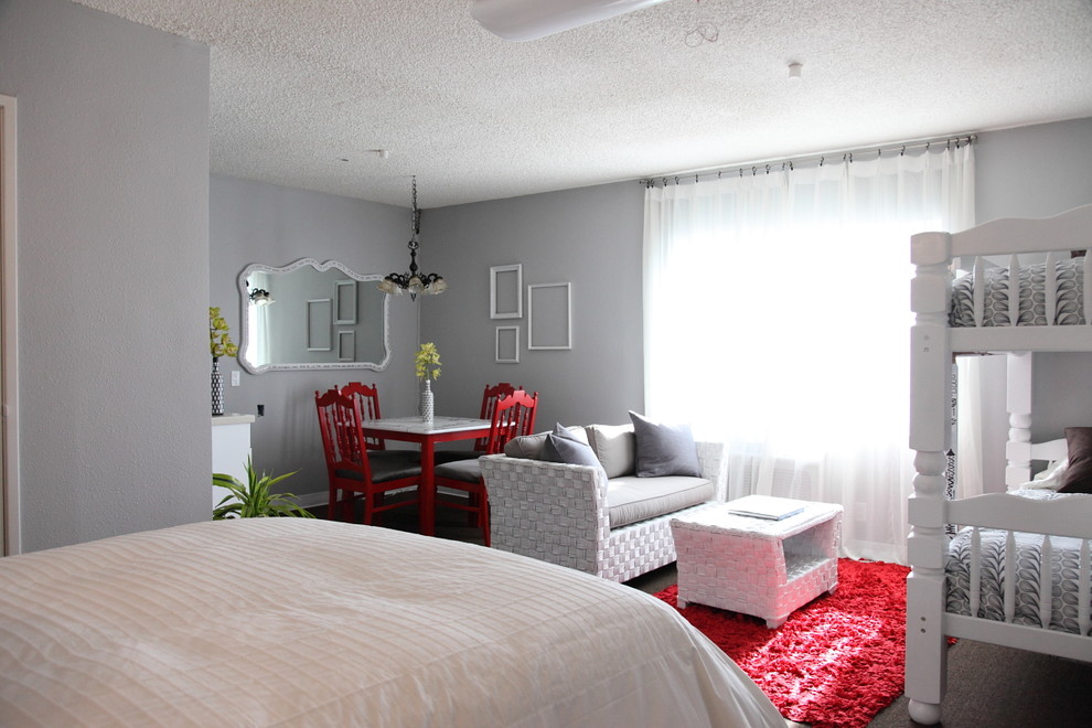 Bedroom - eclectic bedroom idea in Los Angeles with gray walls